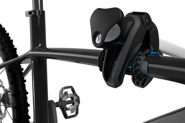 A close-up image of the Thule Carbon Frame Protector in-use on the Thule VeloCompact