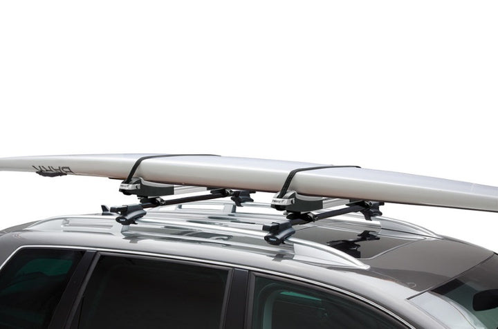 Thule SUP Taxi carrying a SUP on a car roof rack